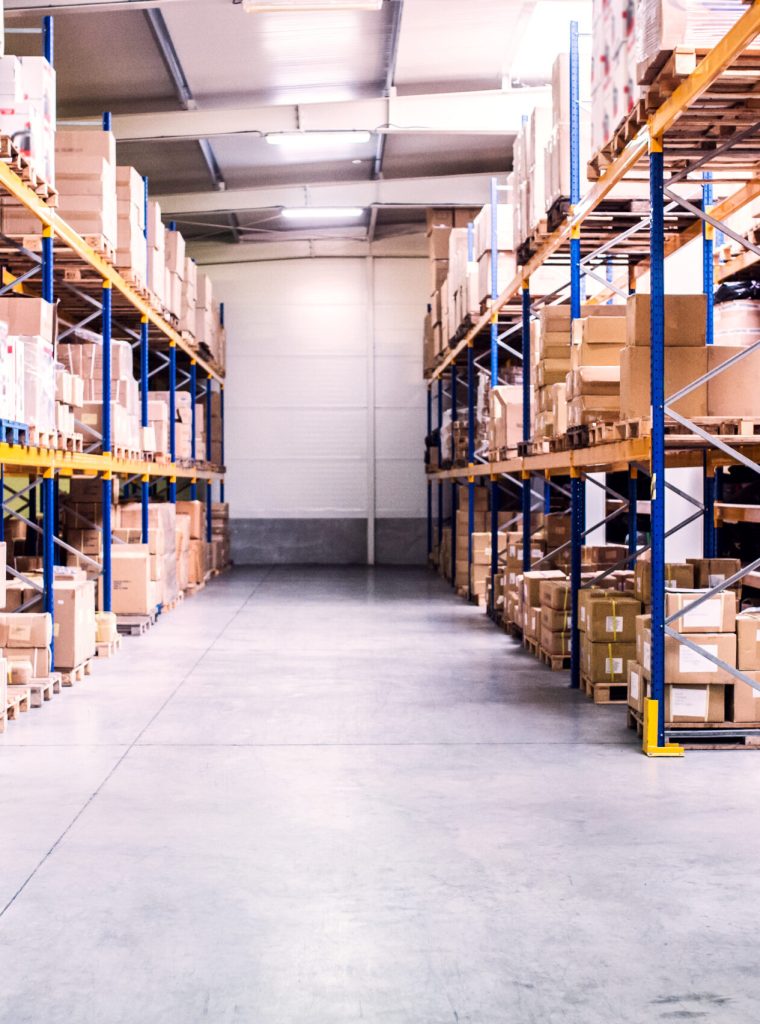 Shelves full of boxes in a warehouse.